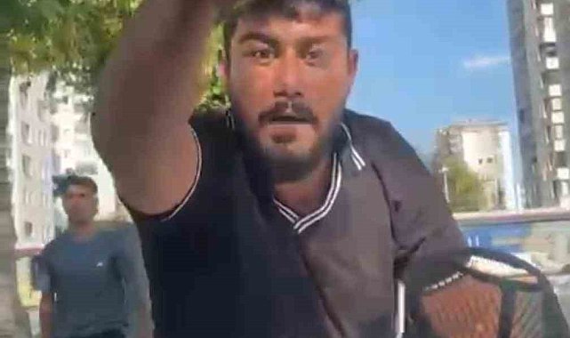 Cam silme bahanesiyle aracın kaputuna yatıp zorla para istemişti, tutuklandı