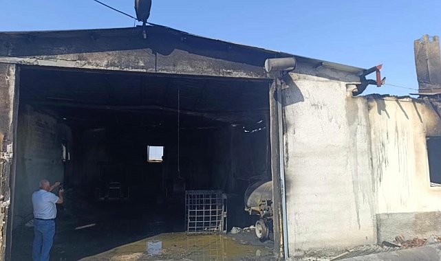 Depoda çıkan yangında 2 traktör, ev ve gübreler yandı