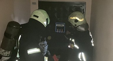 Fırında unutulan kek apartmanı dumana boğdu