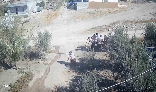 Kafası taşla ezilmek istenen baygın kocasını saldırganlara taş atarak kurtardı