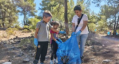 Kepez, öğrencilerle birlikte ormandaki çöpleri temizledi