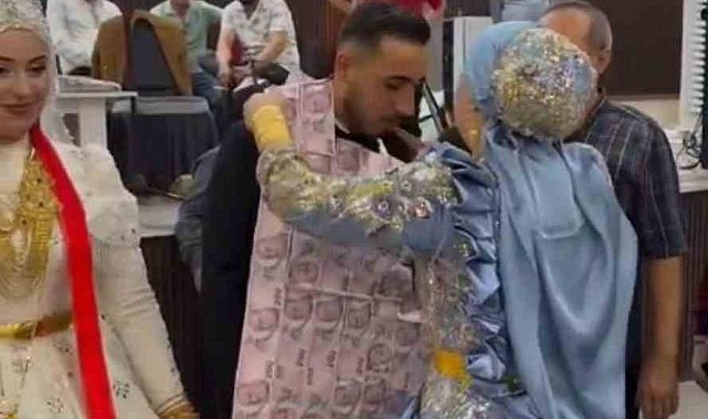 Mardin'de damada 200 liralık banknotlardan oluşan yelek giydirildi