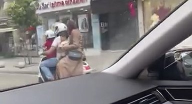 Motosiklette tehlikeli yolculuk