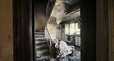 Yakıldığı iddia edilen dairedeki hasar görüntülendi