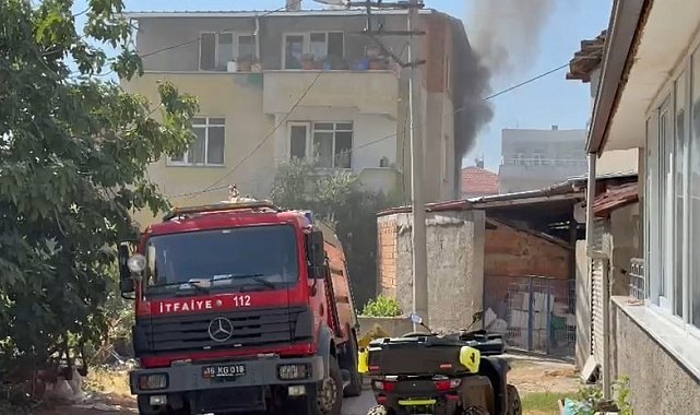 Yangında balkonda mahsur kalan yaşlı kadın kurtarıldı