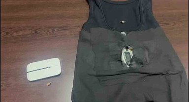 Adana'da ehliyet sınavında tişörte ve kemere yapılan kopya düzeneği polis tarafından bulundu