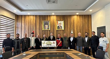 Batman'da 340 bin lira ile rekor fiyata satılan bir kilo balın geliri besicilere verildi