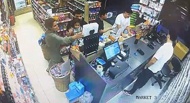 Benzin istasyonundaki bin 500 lira değerindeki oyuncağı çocuğuna çaldırdı