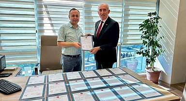 KESOB'un konut projesinde arsaların tapuları alındı