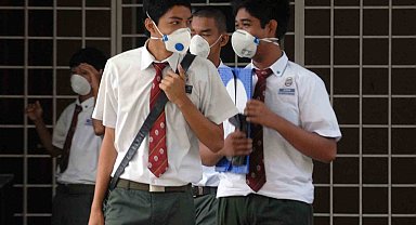 Malezya'da yaklaşık 6 bin öğrenci grip oldu, eğitime ara verildi