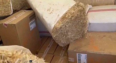 Saman balyalarına gizlenmiş 43 bin paket kaçak sigara ele geçirildi