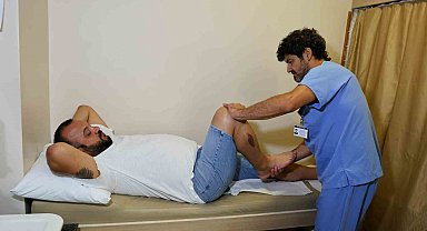 Ağaca takılıp 1,5 saat asılı kalan paraşütçü, yeniden uçmak istiyor