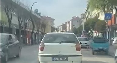 Araçtan sokağa broşür fırlatan kişi, ceza yedi