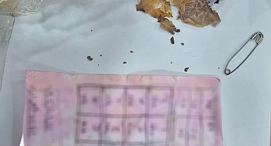 Bolu'da yapı marketin raflarının arasında muska çıktı: "Büyücülerin şerrinden Allah'a sığınırım"