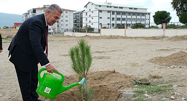 Buharkent'te 'Geleceğe Nefes Olacak' fidanlar toprakla buluştu