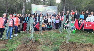 Burhaniye'de 400 fidan toprakla buluştu