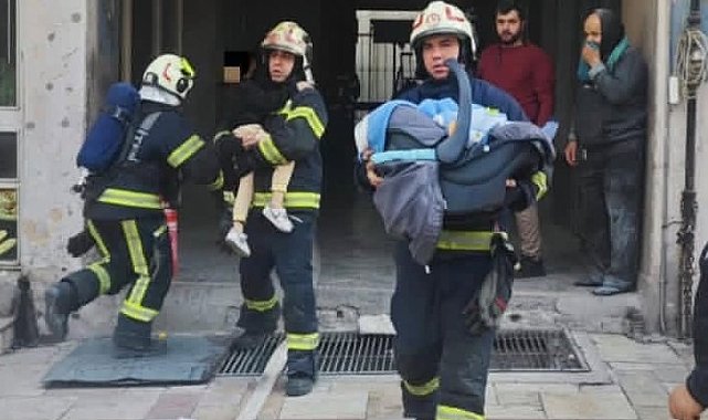 Ev olarak kullanılan iş hanında çıkan yangında 17'si çocuk 21 kişi kurtarıldı