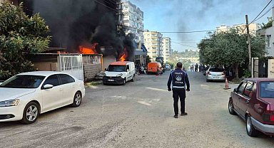 İş yerinde başlayan yangında alevler eve sıçradı