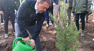 Orman yangınlarından etkilenen bölgede 5 bin fidanı toprakla buluşturuldu