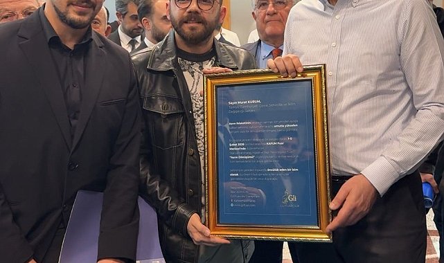 Bakan Kurum'a fuar davetiyesi takdim edildi