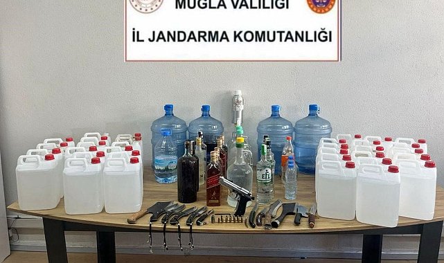 Milas'ta sahte içki ve silah ele geçirildi