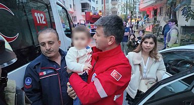 Otomobilde unutulan bebek kurtarıldı