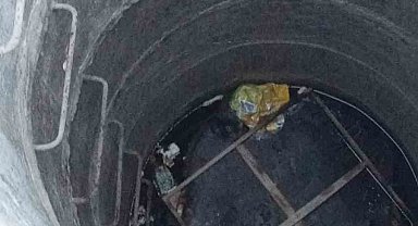 Su kuyusunda mahsur kalan yavru kedi, kurtarılarak annesine teslim edildi