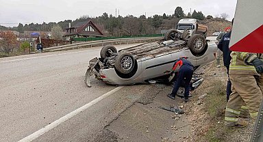 Takla atan otomobilden yara almadan kurtuldu
