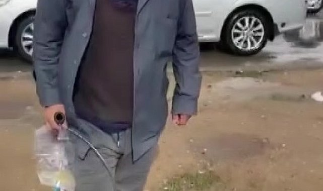 Sonda tüpüne meyve suyu koyup dilencilik yapan şahıs yakalandı