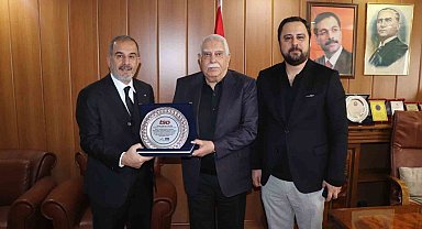 Başkan Alan'dan ekonomiye güç veren isimlere vefa