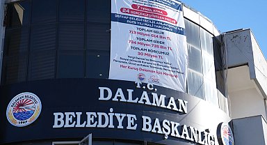 Dalaman Belediyesi mali tablolarını pankartla açıkladı