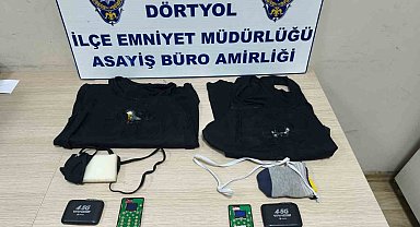 Hatay'da ehliyet sınavına kopya düzeneği ile giren iki kardeş yakalandı