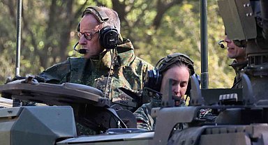 Merz, ABD ile tansiyonu düşürmeye çalıştı