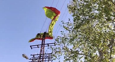 Osmaniye'de yamaç paraşütü pilotu iniş sırasında elektrik tellerine takıldı