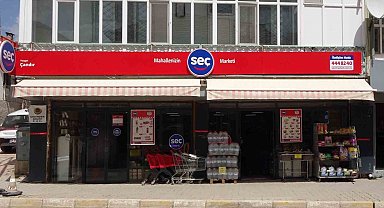 Baba-oğulun mahalle bakkalından Seç Market'e uzanan 40 yıllık yolculuğu