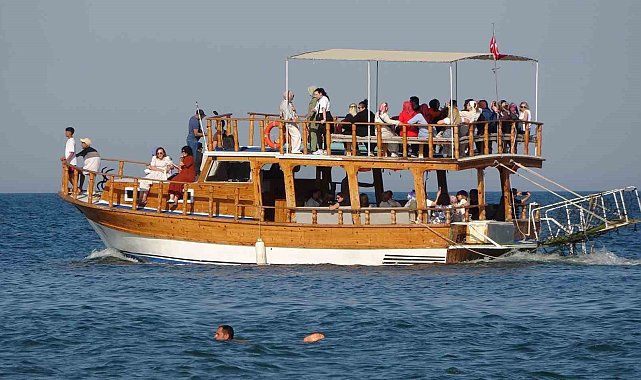 Güneşi gören denize girdi: Havalar ısındı, turizm sezonu başlıyor