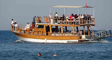 Güneşi gören denize girdi: Havalar ısındı, turizm sezonu başlıyor