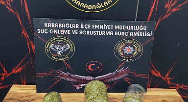 İzmir'de 16 yıl hapisle aranan zehir taciri 2 kilo uyuşturucuyla yakalandı