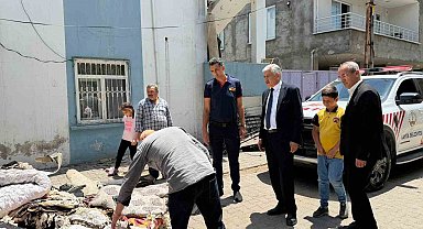 Başkan Hallaç, yangın mağduru aileyi yalnız bırakmadı