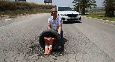 Depremzedelerden belediyeye yol tepkisi: Çukurlara lastik ve duba koydular