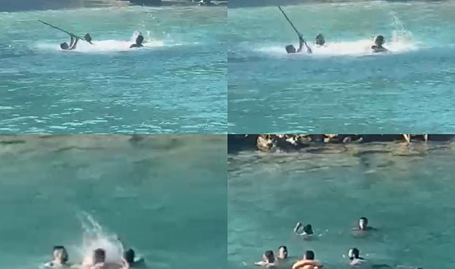 Mersin'de denizin ortasında sopalı kavga kamerada