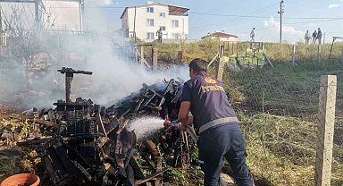 Arazideki odunların tutuşması sonucu yangın çıktı