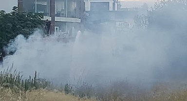 Boş arazide çıkan yangın bahçeye sıçramadan söndürüldü