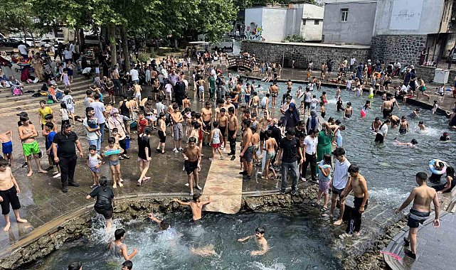Diyarbakır'da sıcağı gören çocuklar Anzele'ye koştu