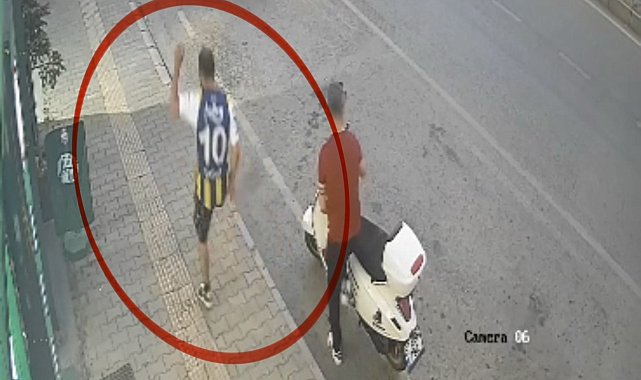 Kediye tekme atan şahıs kamerada