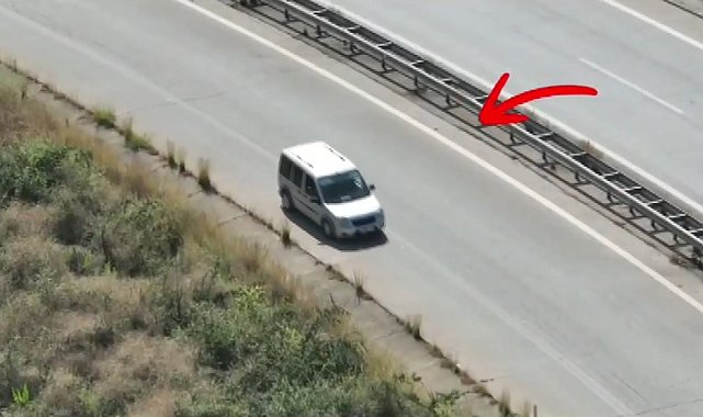 Otoyolda geri geri giden sürücü dron kamerasına yakalandı
