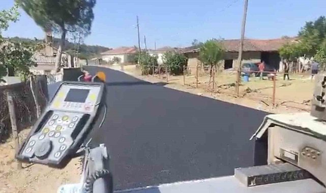Yenice'de köy yollarında sıcak asfalt dökme çalışmaları hız kesmeden devam ediyor