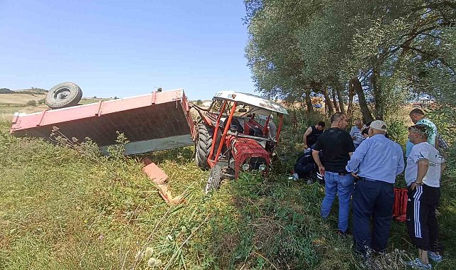 Buğday yüklü traktör devrildi, sürücü yaralandı