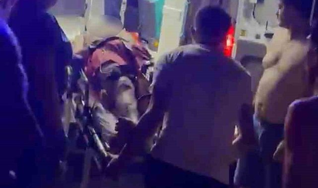 Denizde kalbi duran gence tesadüfen sahilde bulunan sağlık çalışanından hayat kurtaran müdahale