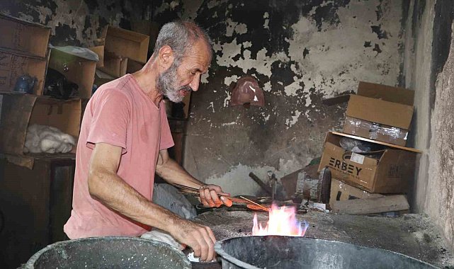 Hem kalaycı hem şair